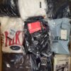 The photo shows a package with clothing in the category C.