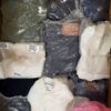 The photo shows a package with clothing in the category D.
