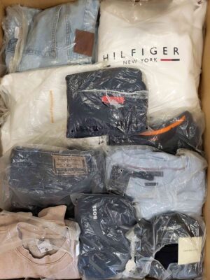 The photo shows a package with clothing in the category D.