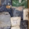 The photo shows a package with clothing in the category D.