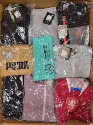 The photo shows a package with clothing in the category AP.