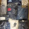 The photo shows a package with clothing in the category D.