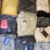 The photo shows a package with clothing in the category D.