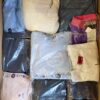 The photo shows a package with clothing in the category D.