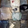 The photo shows a package with clothing in the category D.