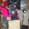 The photo shows a package with clothing in the category AP.