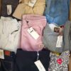 The photo shows a package with clothing in the category T.