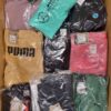 The photo shows a package with clothing in the category AP.