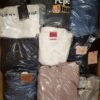 The photo shows a package with clothing in the category C.