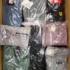 The photo shows a package with clothing in the category AP.
