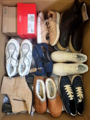 The photo shows a package with clothing in the category BPS.