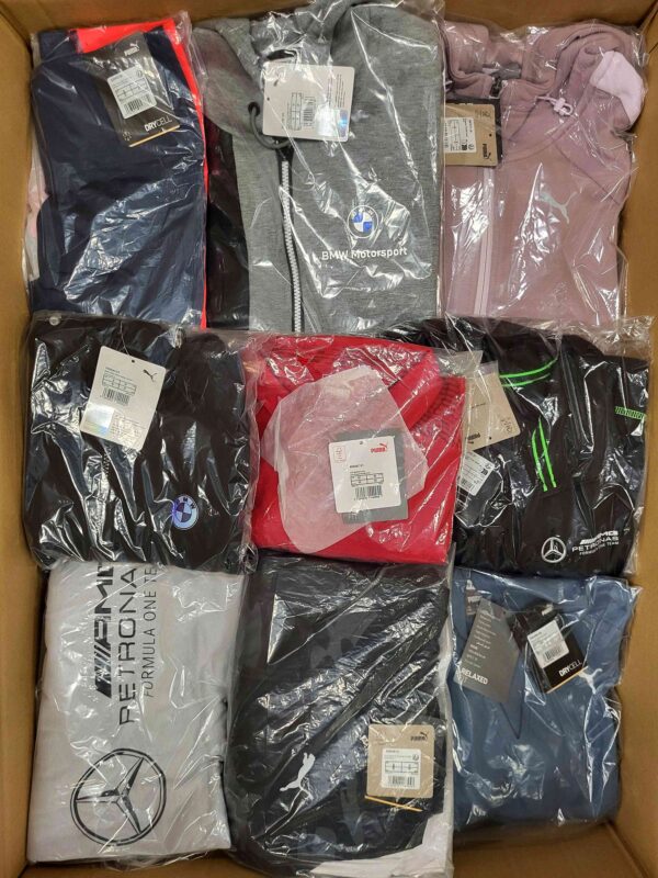 The photo shows a package with clothing in the category AP.