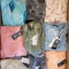 The photo shows a package with clothing in the category B.