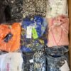 The photo shows a package with clothing in the category B.