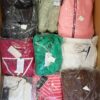 The photo shows a package with clothing in the category B.