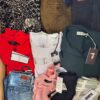 The photo shows a package with clothing in the category T.