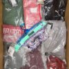 The photo shows a package with clothing in the category AP.