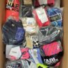 The photo shows a package with clothing in the category ABW.
