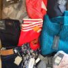 The photo shows a package with clothing in the category T.
