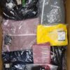 The photo shows a package with clothing in the category AP.