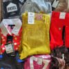 The photo shows a package with clothing in the category T.