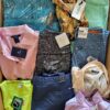 The photo shows a package with clothing in the category T.