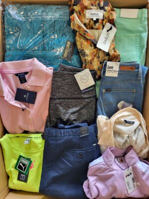 The photo shows a package with clothing in the category T.