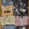 The photo shows a package with clothing in the category AP.