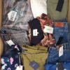 The photo shows a package with clothing in the category T.