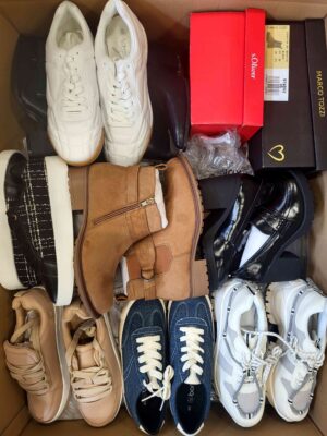 The photo shows a package with clothing in the category BPS.