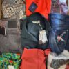 The photo shows a package with clothing in the category T.