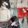 The photo shows a package with clothing in the category B.