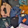 The photo shows a package with clothing in the category T.