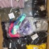 The photo shows a package with clothing in the category AP.