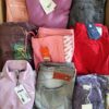 The photo shows a package with clothing in the category T.