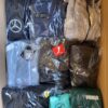 The photo shows a package with clothing in the category AP.