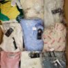 The photo shows a package with clothing in the category B.