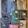 The photo shows a package with clothing in the category AP.