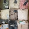 The photo shows a package with clothing in the category B.