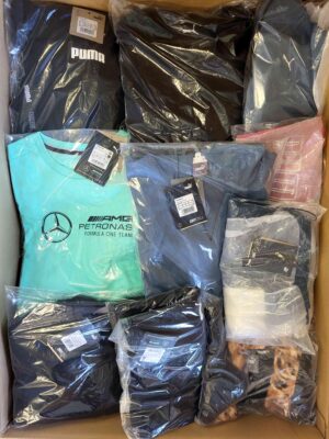 The photo shows a package with clothing in the category AP.