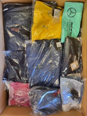 The photo shows a package with clothing in the category AP.