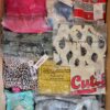 The photo shows a package with clothing in the category N.