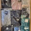 The photo shows a package with clothing in the category AP.