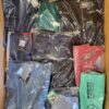 The photo shows a package with clothing in the category AP.