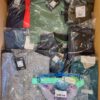 The photo shows a package with clothing in the category AP.