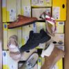 The photo shows a package with footwear in the category SM.