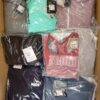 The photo shows a package with clothing in the category AP.