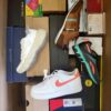 The photo shows a package with footwear in the category BS.