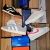 The photo shows a package with footwear in the category BS.