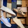 The photo shows a package with footwear in the category BS.